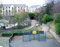 Standing above the north portal of Scotland Street Tunnel looking over the former station site (now a play area) on 26 February 2009. Below is the new pathway and associated works being carried out in connection with the reopening of Rodney Street tunnel which will bring the existing North Edinburgh walkway/cycleway network under Rodney Street and Broughton Road into King George V Park. <br>
<br><br>[Andy Furnevel 26/02/2009]