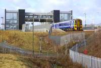 158 703 leaves Edinburgh Park with an eastbound service on 25 February 2009.<br><br>[Bill Roberton 25/02/2009]