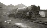 The first of the A1s to be withdrawn was 60123 <I>H A Ivatt</I>, following the Offord collision on 7 September 1962. 60123 was hauling a Kings Cross-Ardsley freight when it ran into the rear of a second freight in the down loop at Offord near Huntingdon. The locomotive is seen at Doncaster on 7 October, shortly after being recovered from the accident site and prior to the commencement of cutting up. The Pacific had emerged new from the same works 13 years earlier.<br><br>[K A Gray 07/10/1962]