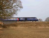 A First Great Western HST seen heading east at Uffington, Oxfordshire, bound for Paddington on 1 March 2009. Much quieter now they have their new engines.<br>
<br><br>[Peter Todd 01/03/2009]
