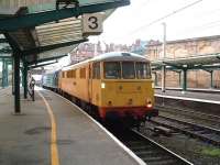 Network Rail load bank testing locomotive 86902 is hauled north through platform 3 at Carlisle on 19 February 2009 by DRS 47712 <I>Pride of Carlisle</I>.<br><br>[Colin Alexander 19/02/2009]