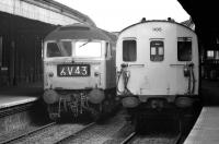 A Class 47 arriving at platform 3 about to pass DEMU no 1105 in platform 4 at Salisbury in July 1974.<br>
<br><br>[John McIntyre /07/1974]