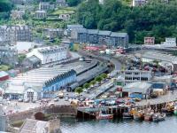 Looking over Oban station in July 1983, with oil traffic prominent in the sidings.<br><br>[Colin Miller /07/1983]