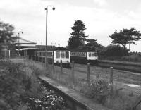 DMUs at Bicester on 6 July 1986, the nearest about to leave on a service to Banbury. The former GWR  station was renamed Bicester North in May 1987 and is now part of the successful <I>Chiltern</I> route between London Marylebone and Birmingham Snow Hill. The other station in Bicester was built by the Buckinghamshire Railway in 1850 and is now known as Bicester Town. It currently operates a shuttle service to and from Oxford.<br><br>[Peter Todd 06/07/1986]