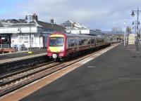 A class 170 with an Alloa - Glasgow Queen Street service stands at Stirling platform 6 on 4 March 2009. This platform is normally used by these trains in both directions.<br><br>[David Panton 04/03/2009]