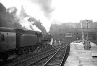 An unidentified Britannia Pacific takes a train west out of Waverley in the 1960s.<br><br>[Robin Barbour Collection (Courtesy Bruce McCartney) //]