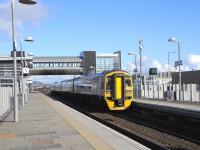 158 786, repainted from SWT livery but still lacking transfers, heads a Bathgate-bound set at Edinburgh Park on 4 March 2009.<br><br>[David Panton 04/03/2009]