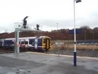 158790 rolls into the east end of Blackburn station for a <I>Then and Now</I> comparison with [See image 22848]. The mill has been replaced by housing but the trackwork and signals are unchanged. Because I was more interested in Class 40s than station architecture in 1982 the pictures do not show the dramatic changes to Blackburn's now demolished trainshed.  <br><br>[Mark Bartlett 03/03/2009]