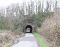 Very near to Burton and Holme station [See image 22857] one of the lanes from Burton passes through this tunnel under the embankment that carries the Lancaster Canal over the valley. Although closed to traffic this stretch of canal still carries water from the Killington Lake feeder reservoir down to the open section south from Carnforth. Map Ref SD 524774. <br><br>[Mark Bartlett 14/03/2009]