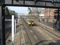 A Euston - Watford local service ascends Camden bank on a sunny 18th March 2009.<br><br>[Michael Gibb 18/03/2009]