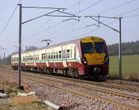 Train for Lanark, formed by 334 032, passing Fullwood in March 2009.  <br><br>[Bill Roberton 20/03/2009]