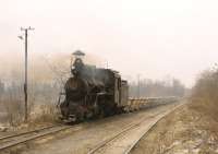 An 0-8-0 metre gauge locomotive at the Dahuichang Limestone works on the outskirts of Beijing on 8 April 2000. I understand one of these is now back in the UK. Ugly is an understatement.<br>
<br><br>[Peter Todd 08/04/2000]