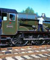 Ex-GWR Castle class 4-6-0 no 5029 <I>Nunney Castle</I> at Moreton-in-Marsh on 27 June 1993, with the driver having a final look around before setting off with a special for Oxford and Didcot.<br><br>[Peter Todd 27/06/1993]