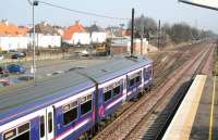 A North Berwick bound 322 set pulls away from the platform at Prestonpans on 21 March 2009. The train is about to run over the points controlling the turn-off for the branch into Cockenzie power station.  <br><br>[John Furnevel /03/2009]