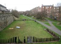 View west from Lindsay Road bridge on 15 March 2009 along the wide trackbed of the Caledonian approach from Newhaven station running towards Leith North and the docks behind the camera. At the higher level off to the left stood the large George Street coal yard. Modern housing now occupies the site and the old yard has gone without trace, as indeed has George Street itself. The former street did however have its <I>15 minutes of fame</I>, when it pretended to be an area of Glasgow as a setting for the controversial Peter McDougall play <I>Just Another Saturday</I>, broadcast by the BBC in 1975. To view this scene 47 years earlier [see image 26330].  <br>
<br><br>[John Furnevel 15/03/2009]