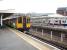 The bay platforms at Richmond serve District Line trains and those of London <I>Overground</I>. Silverlink liveried, but rebranded, 313134 is ready to leave for Stratford as an Underground train arrives. These services share the line from Richmond as far as Gunnersbury.<br><br>[Mark Bartlett 16/01/2009]