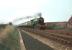 4472 <I>Flying Scotsman</I> with twin tenders attached approaching Scemerston, Northumberland, with a special in the late 1960s.<br><br>[Bruce McCartney //]