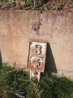 Old marker in Railway Avenue, Duns, now part of ahousing estate built on the line of the railway just before it reached Duns Station.<br><br>[Ian Whittaker 27/02/2009]