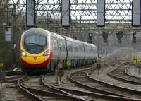 Having just crossed the Ribble Viaduct, 390045 arrives at Preston with a northbound service on 26 March 2009.<br><br>[John McIntyre 26/03/2009]