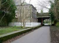 View west along the platforms at Bonnington on 15 March 2009, with the two storey station building on the left providing access from Bonnington Road [See image 23037]. At one time in this view the centre of the bridge would have been bisected by the large and distinctive chimney of the old Chancelot Mill that stood in the background. This section of the North Leith branch was finally closed to freight traffic in 1968.<br>
<br><br>[John Furnevel 15/03/2009]