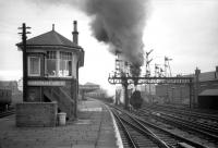 View north west towards the main station from Carstairs No 3 box in the 1960s as a lengthy double headed freight restarts southbound. Carstairs shed stands on the right. <br><br>[Robin Barbour Collection (Courtesy Bruce McCartney) //]