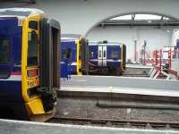 First ScotRail Class 158 units line up at the buffers inside Inverness station. From left to right they are 158741, 731 and 702.  <br><br>[Mark Bartlett 30/03/2009]
