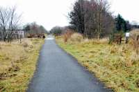 At Stepends, just east of Plains, two branches left the line. One ran east to a colliery at Moffat Hills and another, the Plains Branch, ran west to Ballochney Farm and the north of Plains. The two branches were out of line with each other and about quarter of a mile apart. This view looks east showing the site of the junction between the mainline to Bathgate and the branch to Moffat Hills (right).<br><br>[Ewan Crawford 26/12/2008]