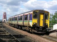 Southbound Class 150 <i>Sprinter</i> slows for the stop at Dalmeny on 21 August 2004<br><br>[James Young 21/08/2004]