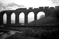 One of Hawick's class 2MT 2-6-0s banking a morning freight over Shankend viaduct on the Waverley Line in the 1960s.<br><br>[Robin Barbour Collection (Courtesy Bruce McCartney) //]