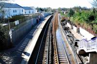 Looking south over Dunlop station. There is a bit of a drainage problem on the right hand side with the new track and platform.<br><br>[Ewan Crawford 29/03/2009]