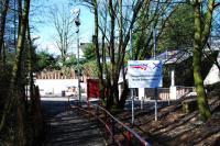 Looking down the ramp to the to-be southbound platform at Dunlop. Beyond a footbridge runs down to the new/reinstated northbound platform. A Network Rail sign proudly (if somewhat minimally) announces the improvements.<br><br>[Ewan Crawford 29/03/2009]