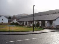 Much of the former Strathyre station is covered by a housing development known as <I>Old Station Court</I>. This view is towards Callander from the junction with the Callander to Crianlarich road that runs past the site. <br><br>[Mark Bartlett 26/03/2009]