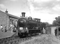 Holmes J36 0-6-0 no 65234 with a railtour at Penicuik terminus in 1964. The Penicuik branch had closed to passengers in 1951 but freight traffic generated by the paper mills along the Esk kept the line open until 1967, the same year the J36 was finally withdrawn from St Margarets. <br><br>[K A Gray 29/08/1964]