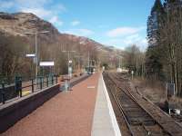A quiet Sunday morning at Ardlui, the next trains being due to cross here in around two hours time.  This picture looks north from alongside the station's subway entrance.<br><br>[Mark Bartlett 29/03/2009]
