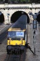 A Glasgow Queen Street bound class 47 <I>Push-Pull</I> service accelerates through Edinburgh Princes Street gardens on 11th May 1985.<br>
<br><br>[Mark Dufton 11/05/1985]