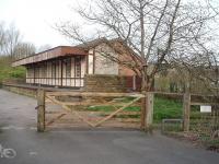 It looks like the last train called at Halton station yesterday rather than over 40 years ago as it is well maintained by the rowing club that now uses it as a base. It sits on the Caton to Lancaster Green Ayre cycle track and behind the building the integral goods shed can be seen. Beyond the station the bridge over the River Lune can be glimpsed through the trees. This was a railway owned toll bridge until the station closed but now, substantially rebuilt although still very narrow, it is owned by the local authority and toll free. <br><br>[Mark Bartlett 06/04/2009]