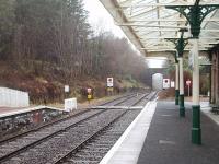 View west towards Loch Awe, from under the shelter of the platform canopy, at a very wet Dalmally station. Dalmally is one of two stations between Crianlarich and Oban that retain its passing loops, under radio signalling control.  <br><br>[Mark Bartlett 27/03/2009]