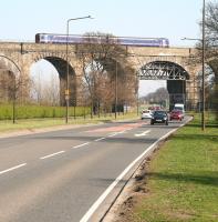 A 158 heading for Edinburgh on 2 April crosses the A89 east of Broxburn on the western section of the Almond Viaduct.<br><br>[John Furnevel 02/04/2009]