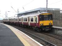 A Milngavie Service, formed by 318 256, calls at Partick on 1 April 2009.<br><br>[David Panton 01/04/2009]