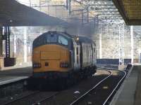 37612 passes through Paisley Gilmour Street at the rear the overhead line test coach <I>Mentor</I> on 18th March<br><br>[Graham Morgan 18/03/2009]