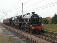 Heading north to Glasgow in preparation for the <I>Great Britain II</i> railtour leg from Glasgow to Inverness on the 10th are Black 5 pairing of 45231 <I>The Sherwood Forester</I> and 45407 <I>The Lancashire Fusilier</I>. They are seen passing Leyland at 0739 hrs on 09 April 2009.<br><br>[John McIntyre 09/04/2009]