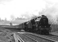 Train 1Z25, the <I>Great Britain II</I>, heading for Inverness, nears Bridge of Allan in the early afternoon of 10 April 2009, behind Stanier Black 5s 45231 <I>The Sherwood Forester</I> and 45407 <I>The Lancashire Fusilier</I>.<br>
<br><br>[Neil Scott 10/04/2009]