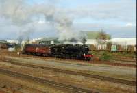 61994 with its support coach leaves Inverness for Thornton on 12 April having undertaken GB2 duties the previous day.<br><br>[John Gray 12/04/2009]