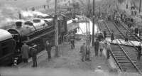 Ivatt 2-6-0 no 43129 at Reedsmouth on 9 November 1963 with the RCTS/SLS <I>Wansbeck Wanderer</I>. View from the signal box is south towards Hexham with the train standing at the Wansbeck Valley platform and the Border Counties line to Riccarton Junction on the right.<br><br>[K A Gray 09/11/1963]