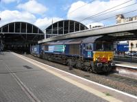 Diverted via the ECML due to engineering work on the WCML, DRS 66417 heads the Tesco container train north from Newcastle on 11 April.<br><br>[Michael Gibb 11/04/2009]