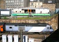 The 0952 Aberdeen - London Kings Cross about to enter Haymarket tunnel eastbound on 7 April 2009 after restarting from its stop at Haymarket, just as the coffee brigade gets stuck into another cuppa in the local Starbucks. <br><br>[John Furnevel 07/04/2009]