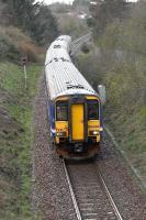 The 4-car 16.43 Glasgow Central to East Kilbride service, approaching its destination on 4 April. <br><br>[John Steven 04/04/2009]