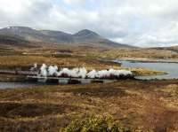 K4 61994 <I> The Great Marquess </I> pictured east of Achanalt with <I> The Great Britain II </I>. Loch Achanalt in the background. Sgurr A Mhuilinn (860M) dominates the scene.<br><br>[John Gray 11/04/2009]