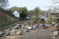 Looking north across the site of Turton station and the level crossing on 18 April 2009. The former goods yard is in the foreground currently being used to store materials for the new buildings to the right of the station.<br><br>[John McIntyre 18/04/2009]