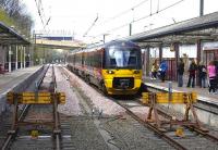 333 005 at the 1990 Bradford Forster Square station on 18 April 2009, with Bradford City FC stadium in the background.<br><br>[Bill Roberton 18/04/2009]